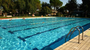 Enjoy a holiday home with pool, garden and fireplace